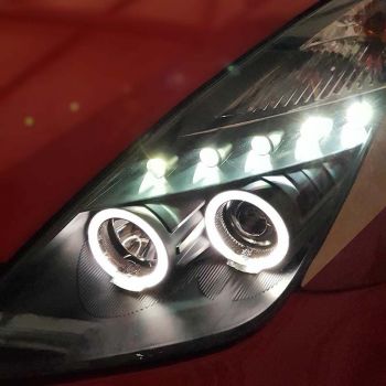 Μπροστινά Φανάρια Set Για Toyota Celica T230 99-05 Angel Eyes & Led Μαύρα H3/H1 Manual Junyan